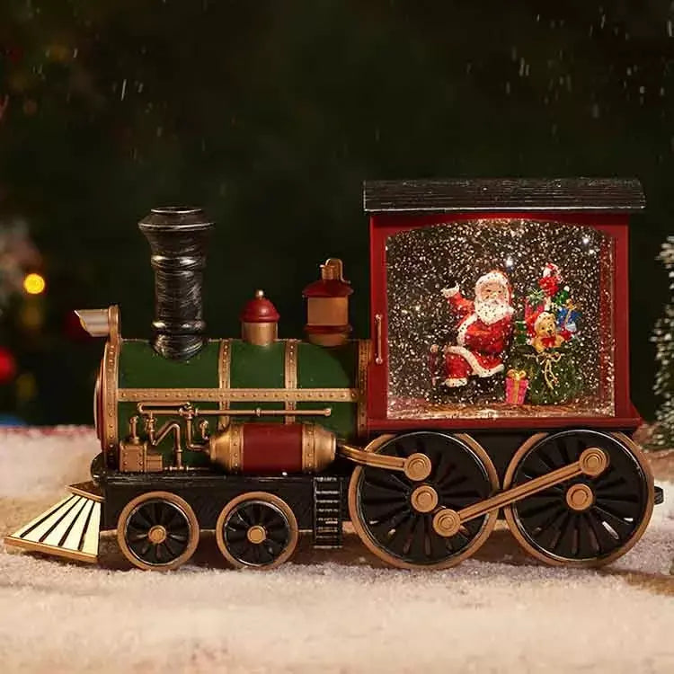 Vakkert opplyst juletog med glitrende lys og fallende snø, skaper festlig og nostalgisk julepynt.