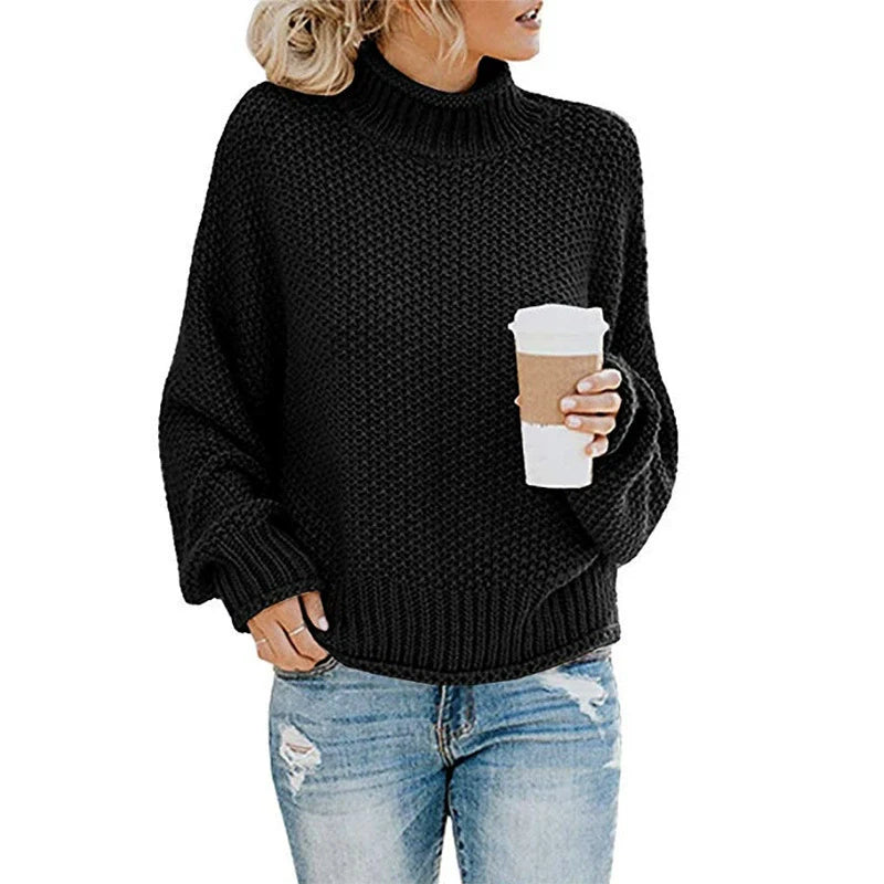 Avslappet oversized damegenser, strikket med høy hals og løse batwing-ermer for maksimal komfort. Perfekt fritidsgenser.