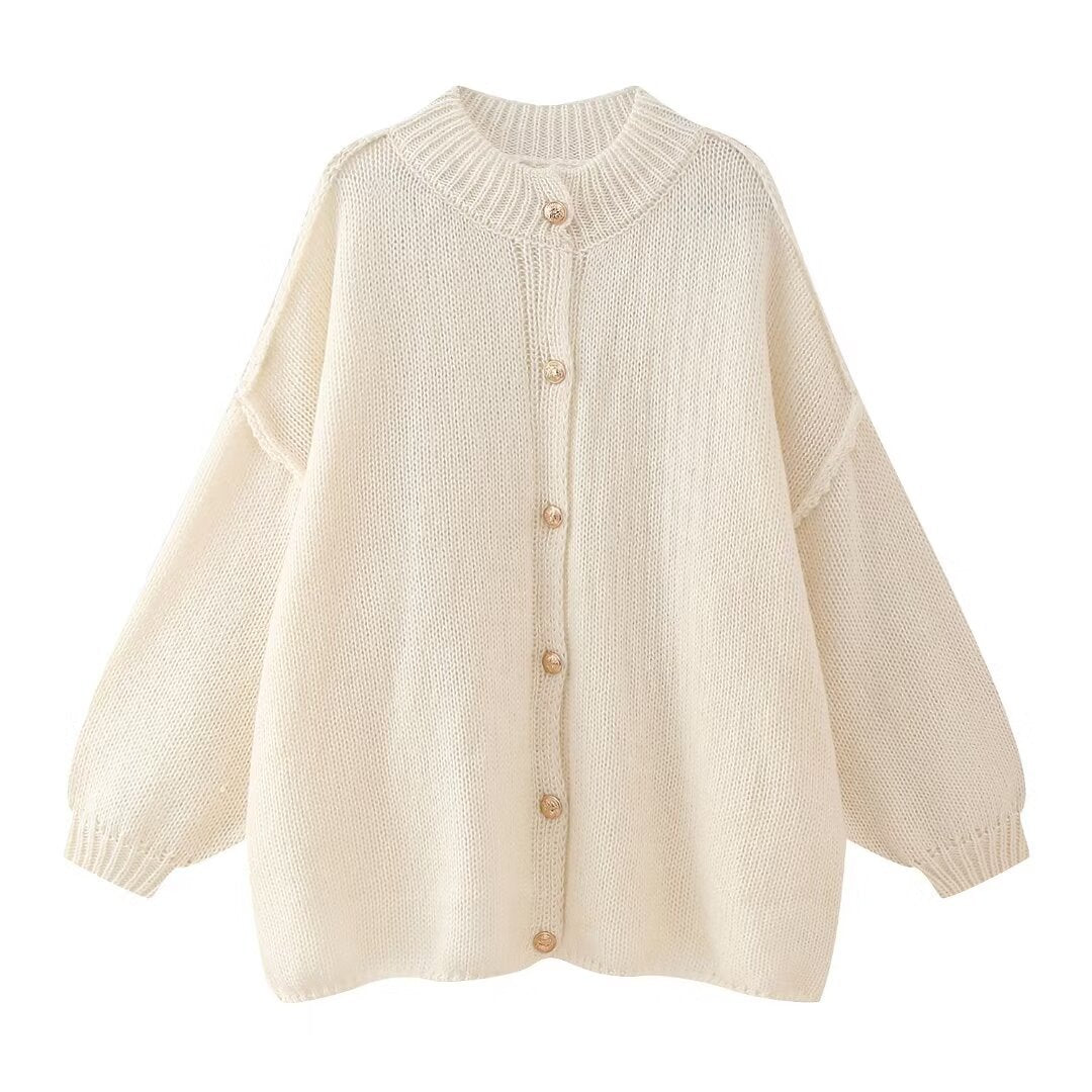 Varme og komfort med denne oversized damecardiganen. Knappefram design for enkel bruk i vintermote.