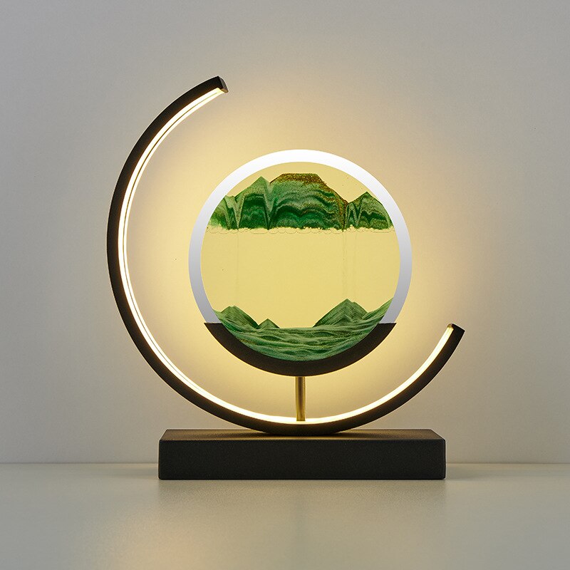 "Quicksand bordlampe med 3D-sandmaleri, elegant design i svart med dynamisk sandbevegelse, avslappende atmosfære."