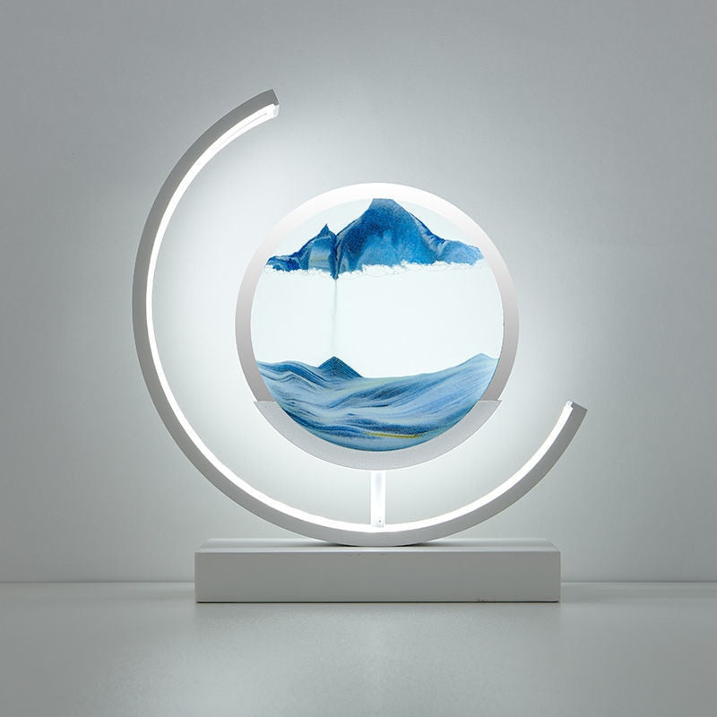 "Quicksand bordlampe med 3D-sandmaleri, elegant design i svart med dynamisk sandbevegelse, avslappende atmosfære."