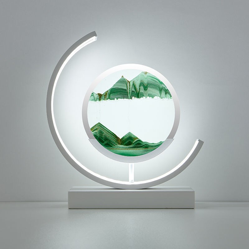 "Quicksand bordlampe med 3D-sandmaleri, elegant design i svart med dynamisk sandbevegelse, avslappende atmosfære."