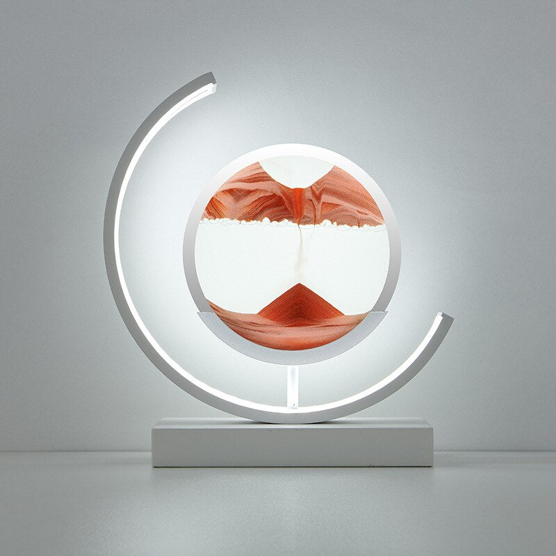 "Quicksand bordlampe med 3D-sandmaleri, elegant design i svart med dynamisk sandbevegelse, avslappende atmosfære."