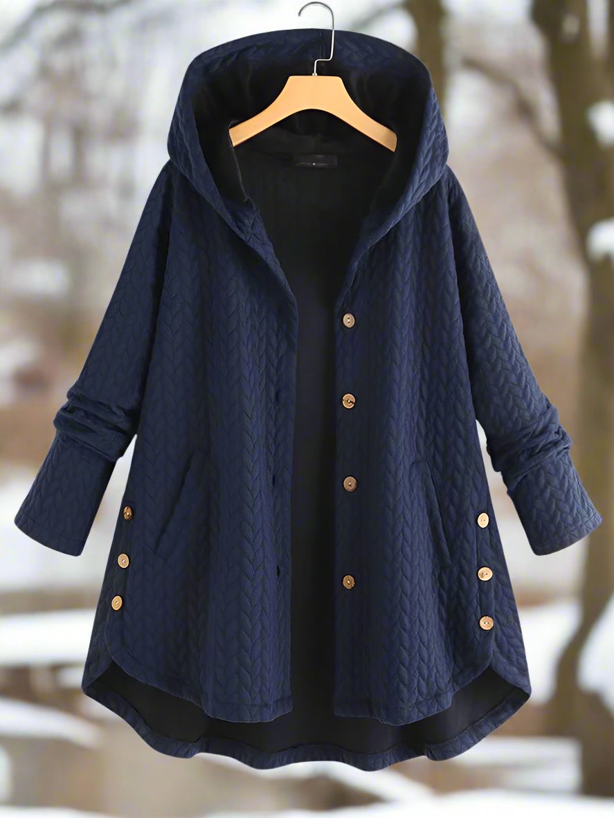 Oversized quiltet vinterjakke for damer, med praktisk hette. Ideell for høst og vinter, stilfull og varm.