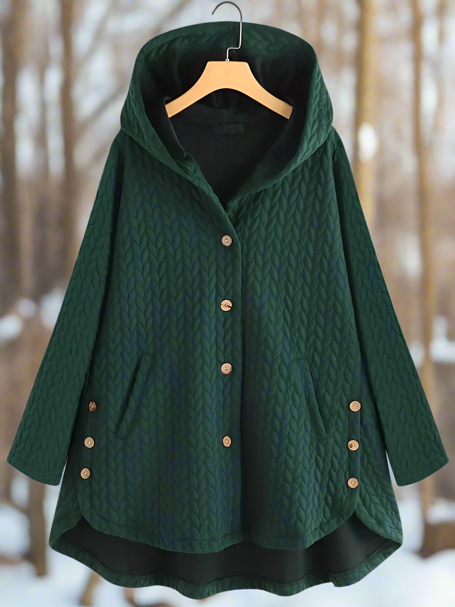 Komfortabel dame vinterjakke, quiltet og oversized, med hette. Unik asymmetrisk design gir et moderne preg.