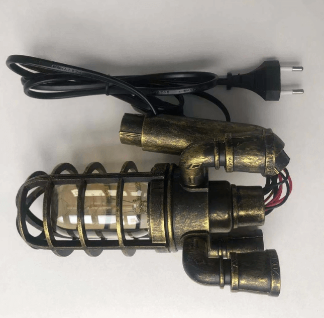 Steampunk rakettlampe i metallisk finish, et vintage element med moderne LED-teknologi