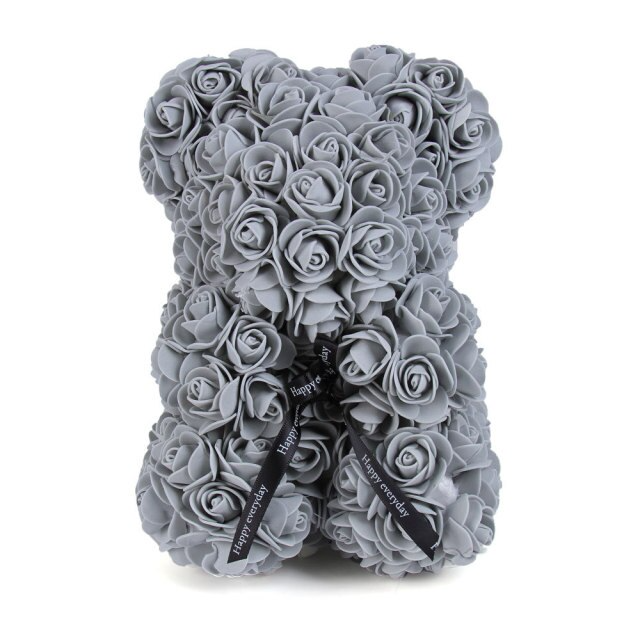 Elegant rosebjørn figur i pastellfarger, laget av skumroser. Flott hjemmeinnredning og gave.