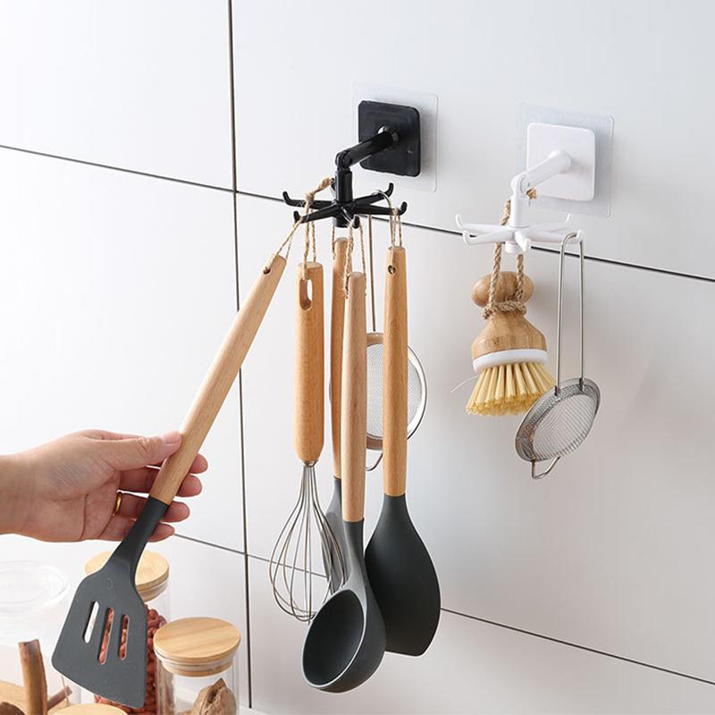"Roterende knagg i svart ABS-materiale, 360° funksjon, for kjøkken eller soverom, stilig og kompakt design."