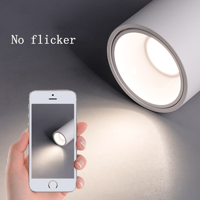 "Rund moderne taklampe med COB-teknologi, elegant hvit overflate og minimalistisk design, perfekt for moderne interiør."