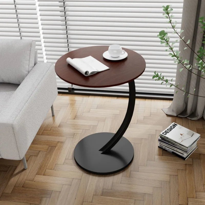 Rundt nattbord i moderne design, en kompakt og elegant løsning for soverommet.