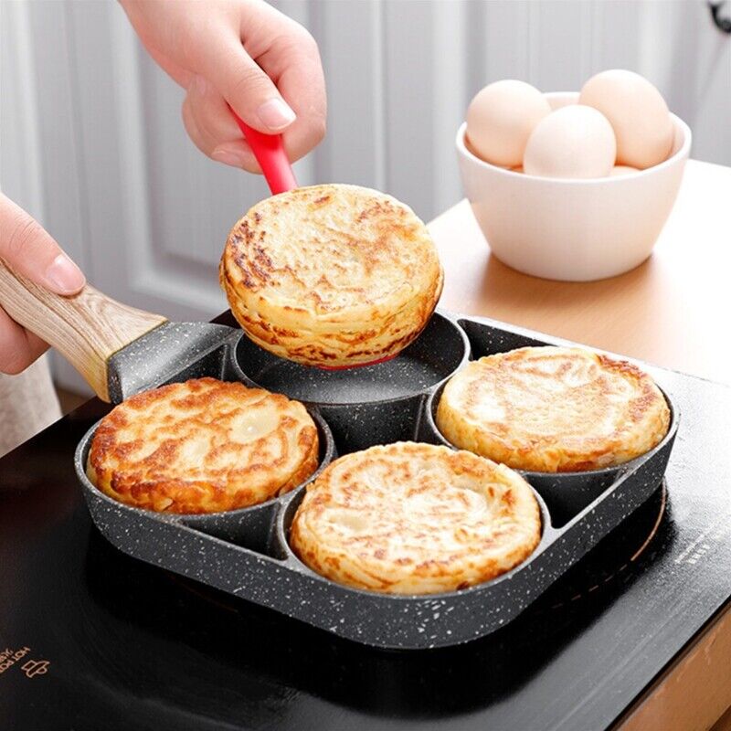 Praktisk rustfri eggpanne med nonstick overflate for enkel tilberedning av 4 egg til frokost.