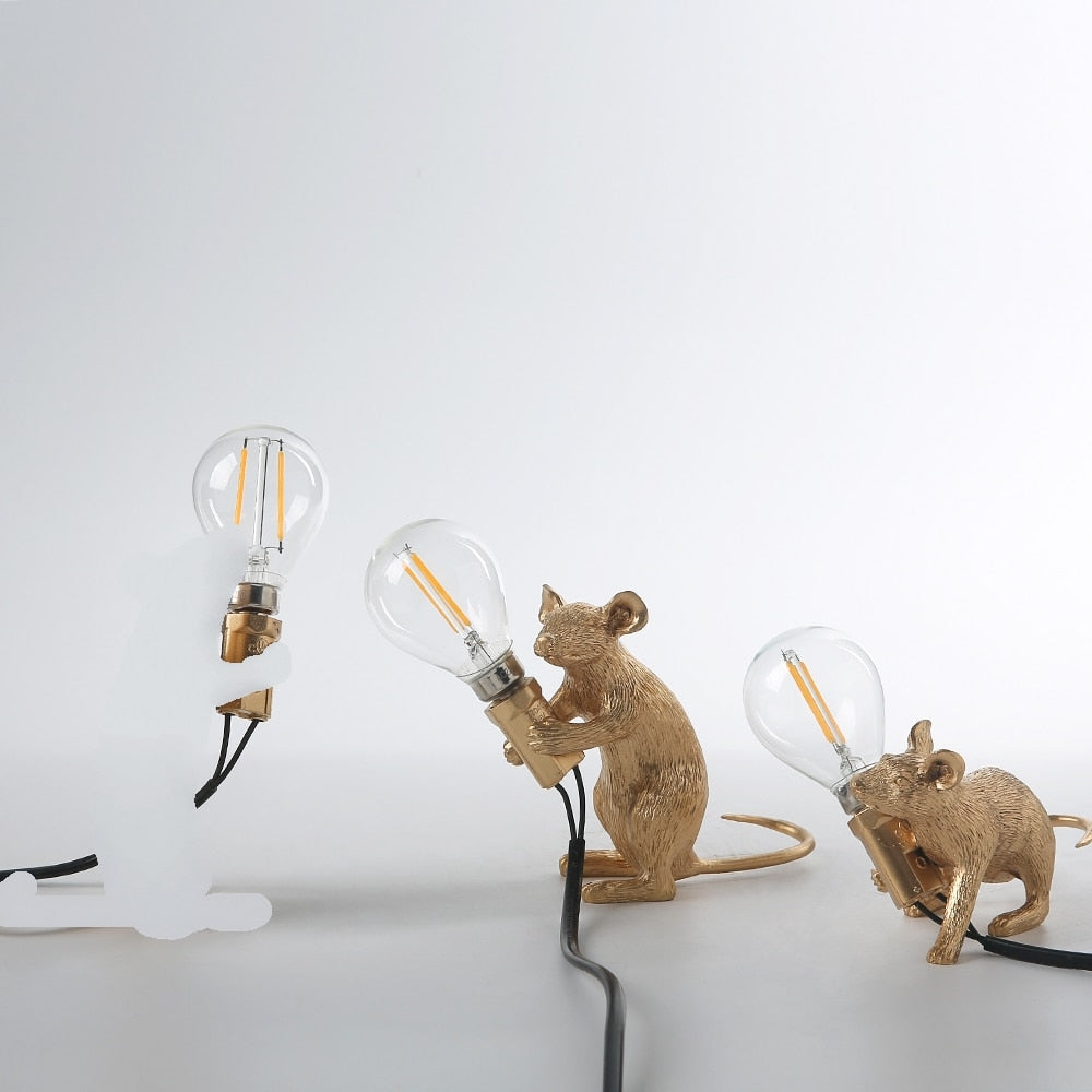 Håndlaget harpiks muselampe, en dekorativ LED bordlampe som gir et varmt og innbydende lys.