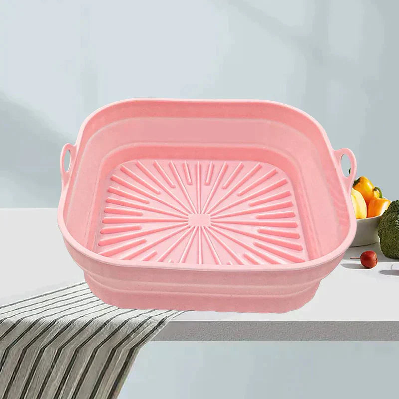 "Sammenleggbar silikongrillpanne for matlaging. Rød, plassbesparende design. Perfekt til airfryers og ovn."