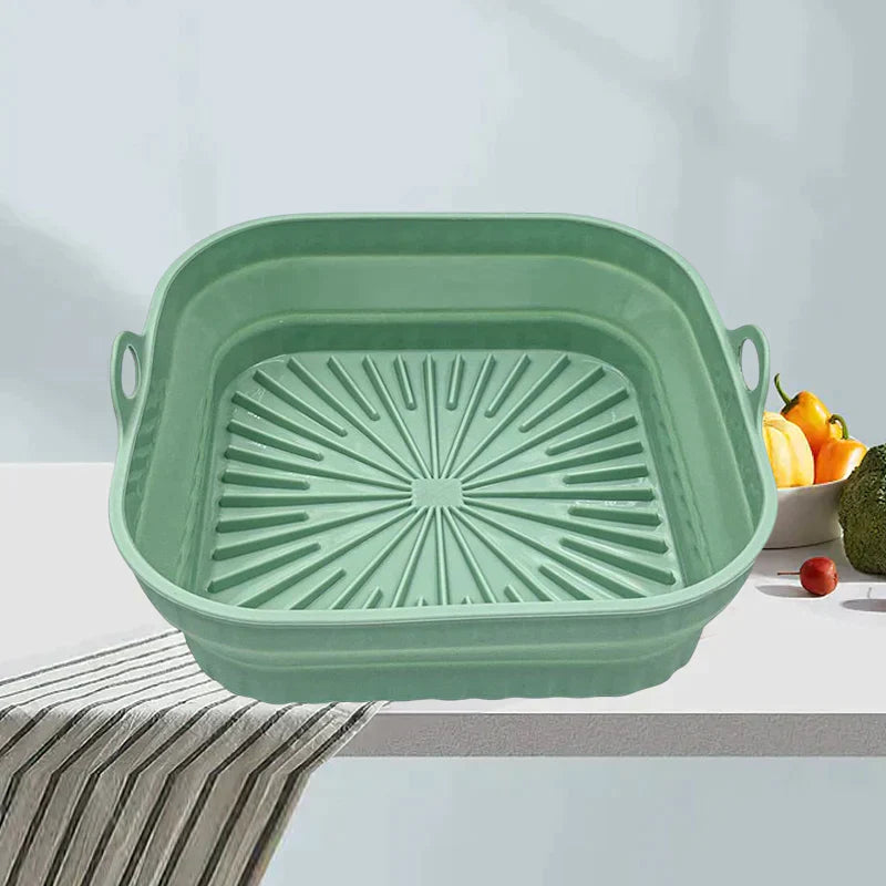 "Sammenleggbar silikongrillpanne for matlaging. Rød, plassbesparende design. Perfekt til airfryers og ovn."