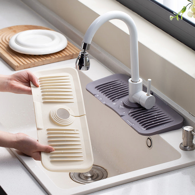"Silikon sprutbeskyttelsesmatte - vanntett, grå, selvdrenerende design, enkel installering. Perfekt for kjøkkenvask."