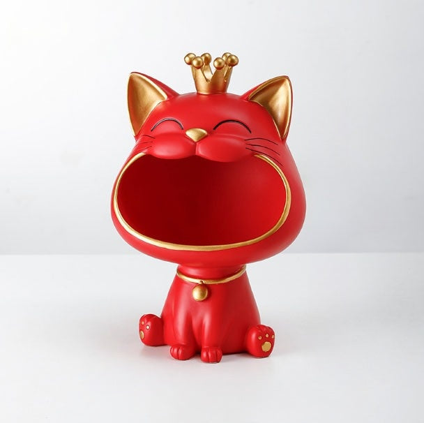 Dekorativ kattestatue i harpiks, en feng shui pyntegjenstand for å tiltrekke lykke og gode vibber til hjemmet.