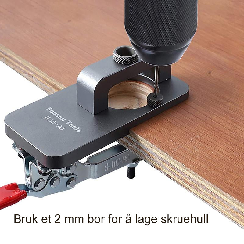 "Skjult hengseljigg for presisjon, grå aluminiumslegering, enkel montering med justerbar boredybde."