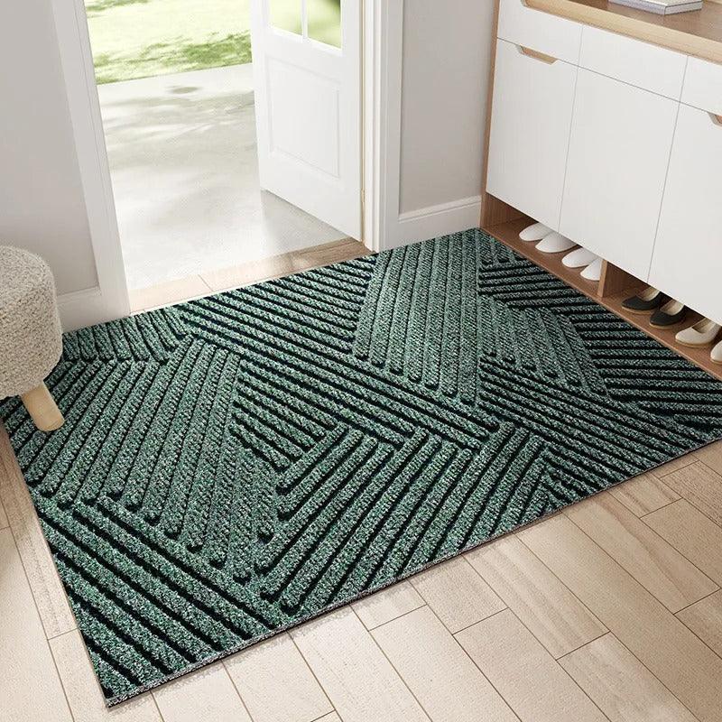 "Slitesterk, sklisikker dørmatte i blått PVC, ideell for innendørs og utendørs bruk. Enkel å rengjøre, ren design."