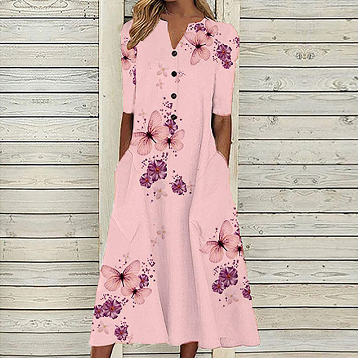 Sommerkjole med blomster- og sommerfugltrykk, A-line snitt, V-hals, lommer, elegant og praktisk design, perfekt for varme dag