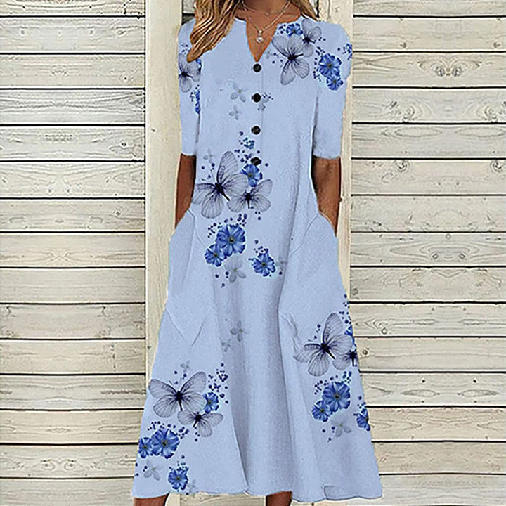 Sommerkjole med blomster- og sommerfugltrykk, A-line snitt, V-hals, lommer, elegant og praktisk design, perfekt for varme dag