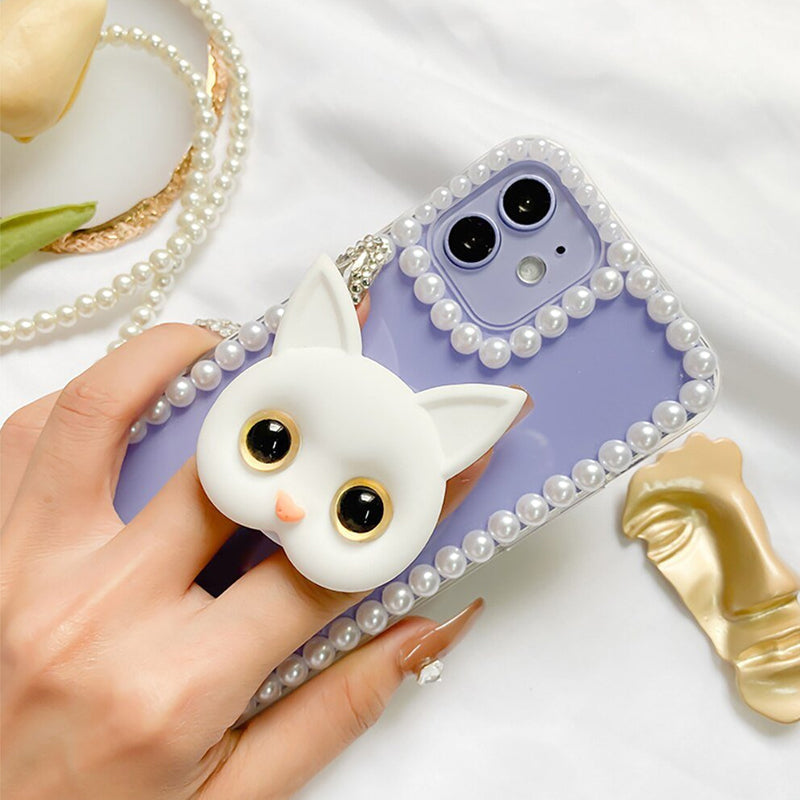 "Søt 3D Cat-telefonholder med minispeil i gull og blå øyne; hvit telefonholder med dekorativ kattedesign."