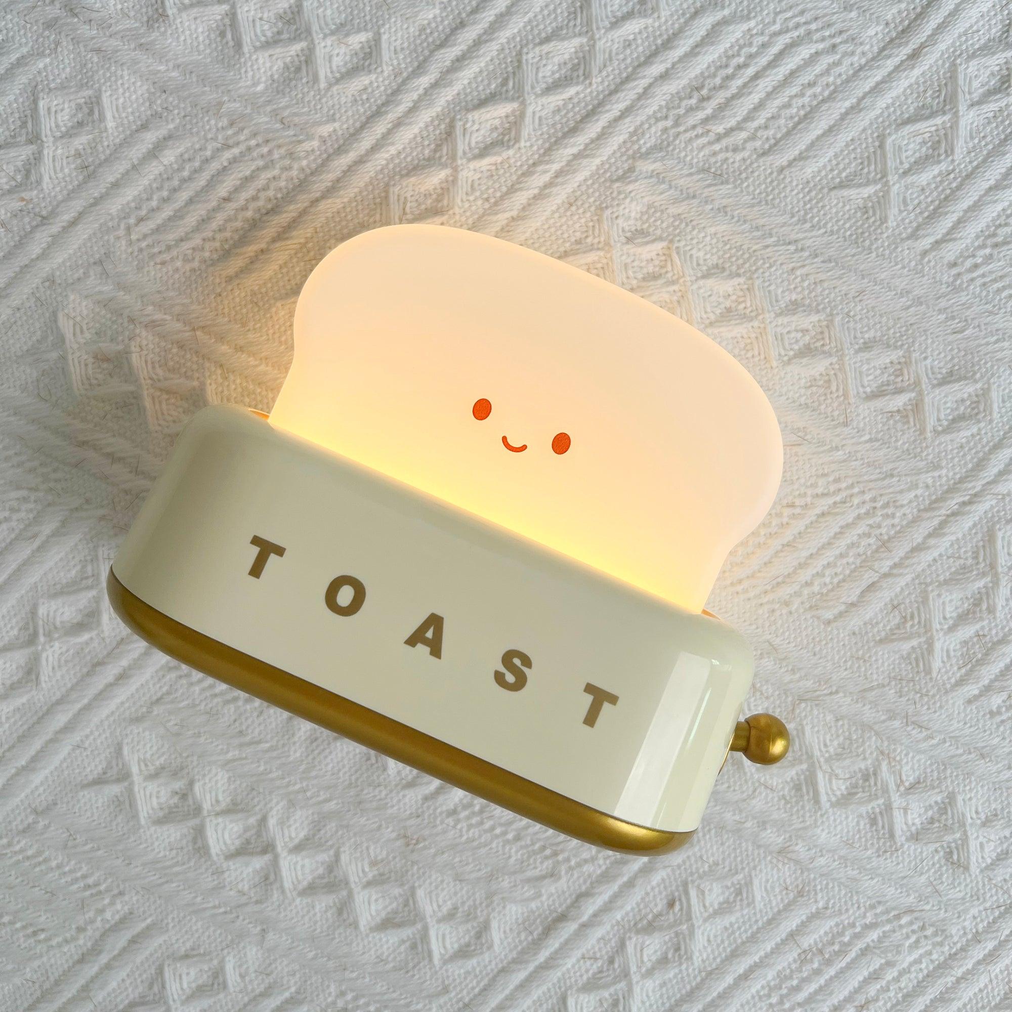 "Søt bordlampe i brødristerform, trådløs, oppladbar, i metalliakryl, justerbar lysstyrke, grønn, mandelgul, rosa."
