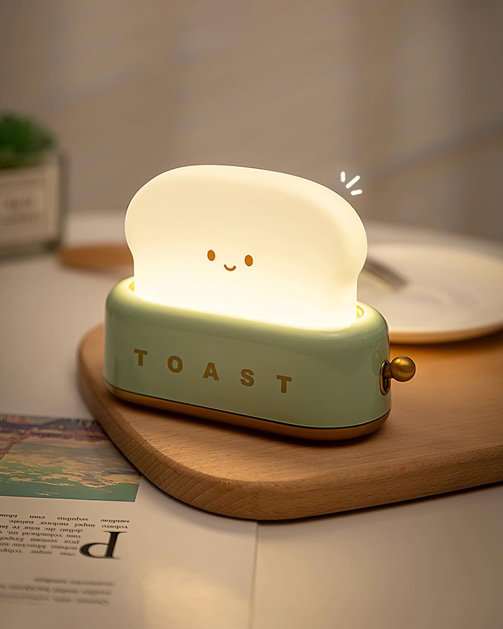 "Søt bordlampe i brødristerform, trådløs, oppladbar, i metalliakryl, justerbar lysstyrke, grønn, mandelgul, rosa."