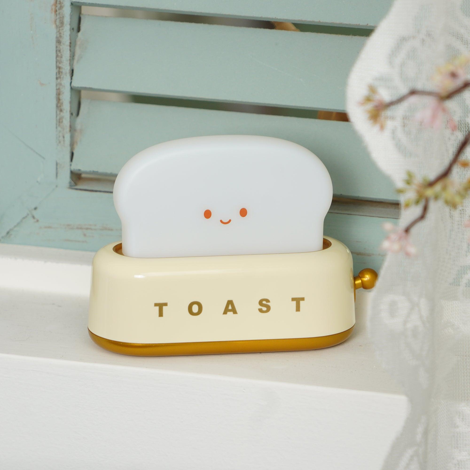 "Søt bordlampe i brødristerform, trådløs, oppladbar, i metalliakryl, justerbar lysstyrke, grønn, mandelgul, rosa."