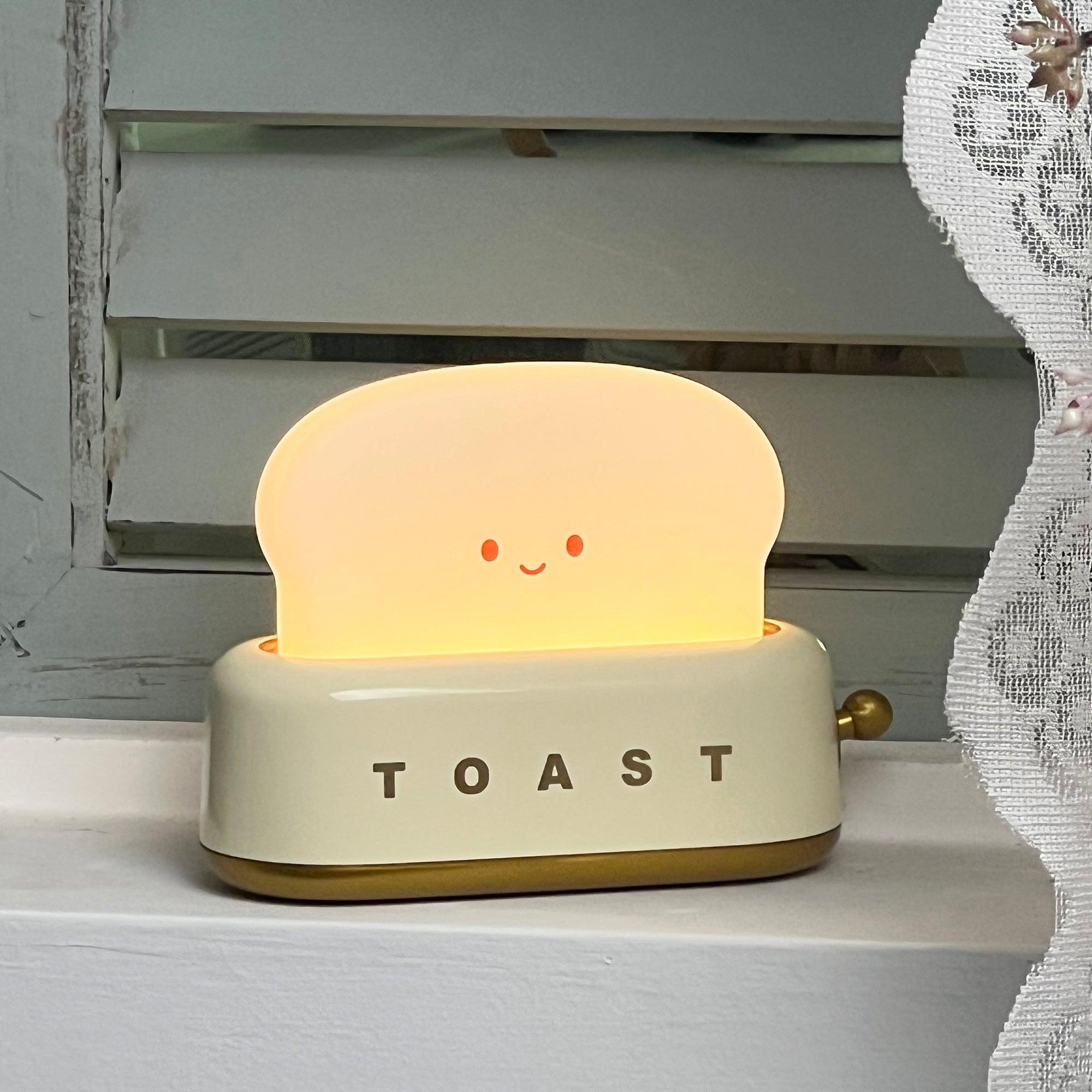 "Søt bordlampe i brødristerform, trådløs, oppladbar, i metalliakryl, justerbar lysstyrke, grønn, mandelgul, rosa."