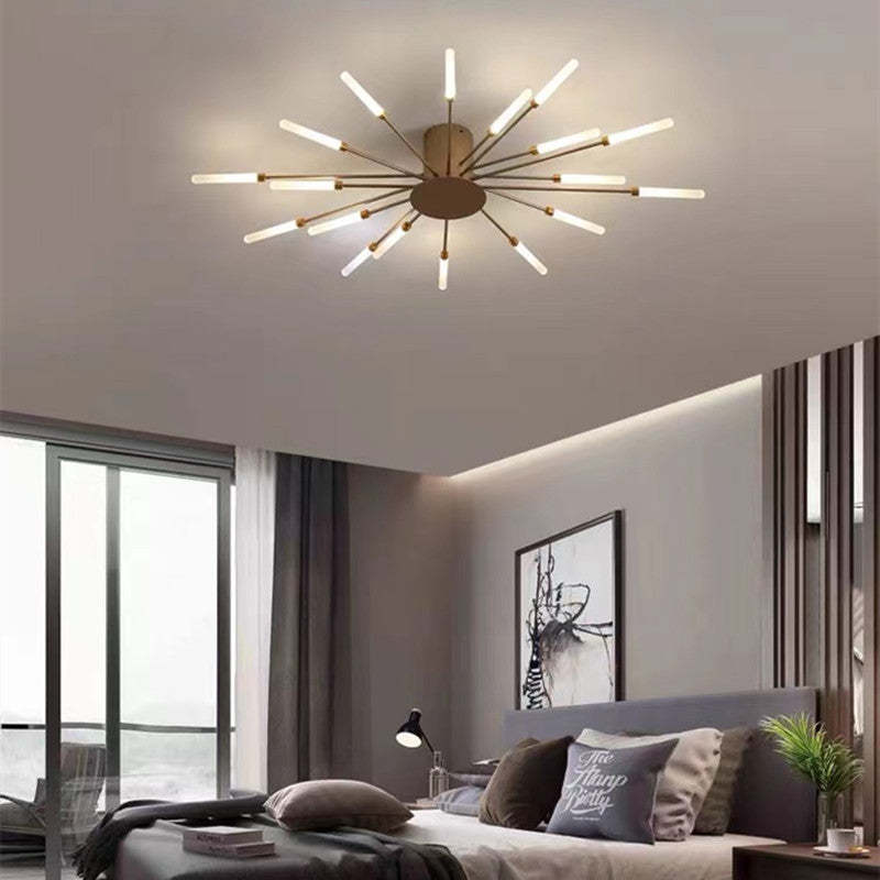 "Stilfull metallisk taklampe med LED-lys og fyrverkerimønster, tilgjengelig i gull og svart, for moderne hjem."