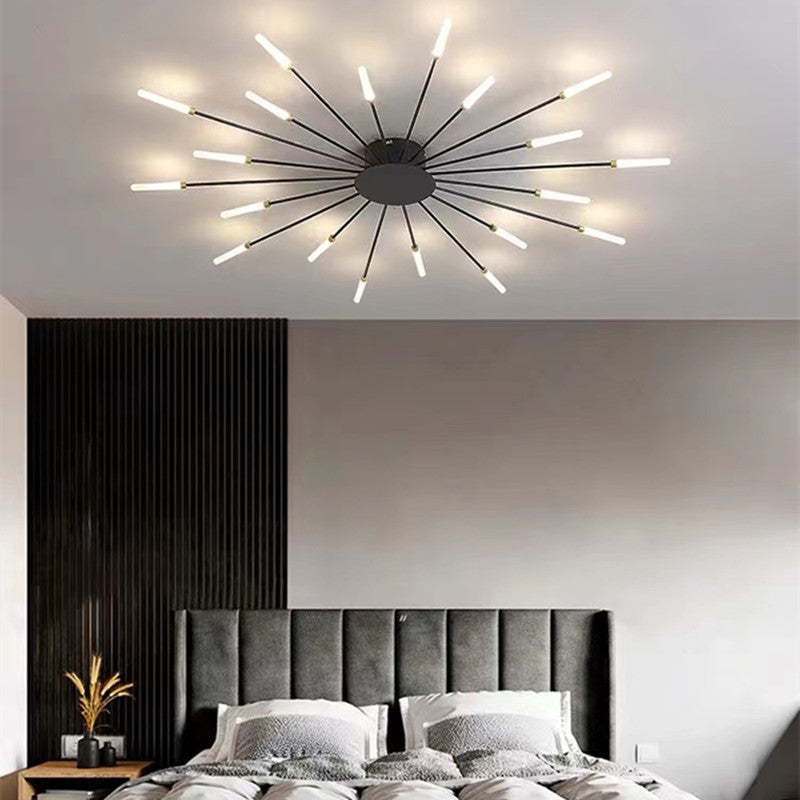 "Stilfull metallisk taklampe med LED-lys og fyrverkerimønster, tilgjengelig i gull og svart, for moderne hjem."