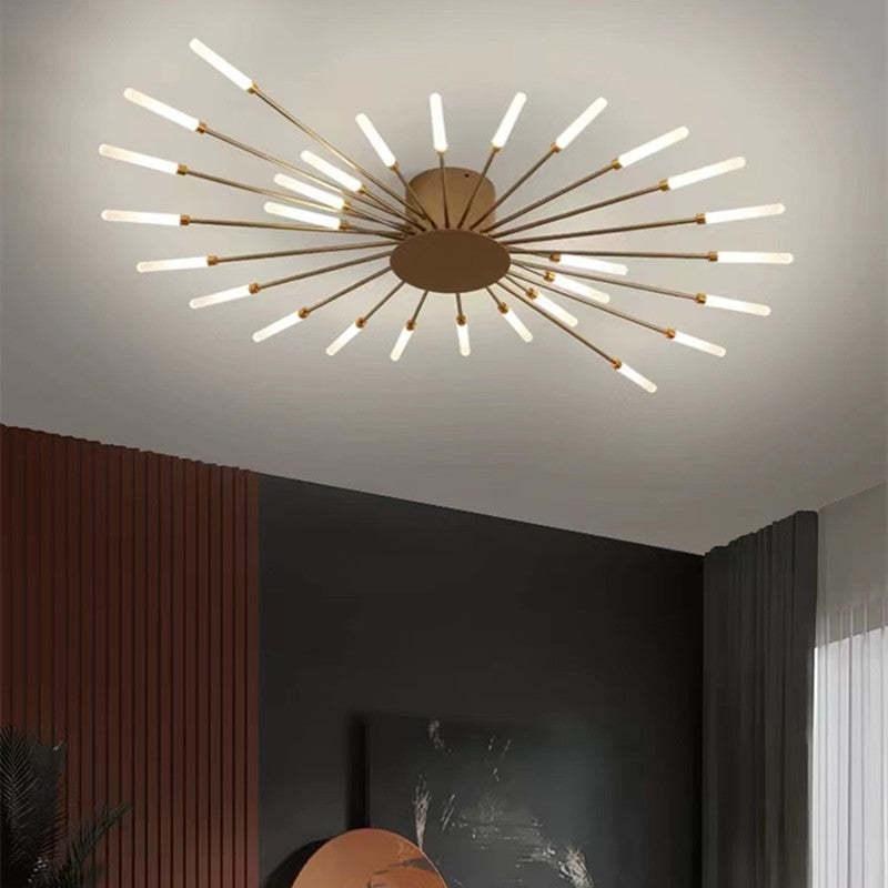"Stilfull metallisk taklampe med LED-lys og fyrverkerimønster, tilgjengelig i gull og svart, for moderne hjem."