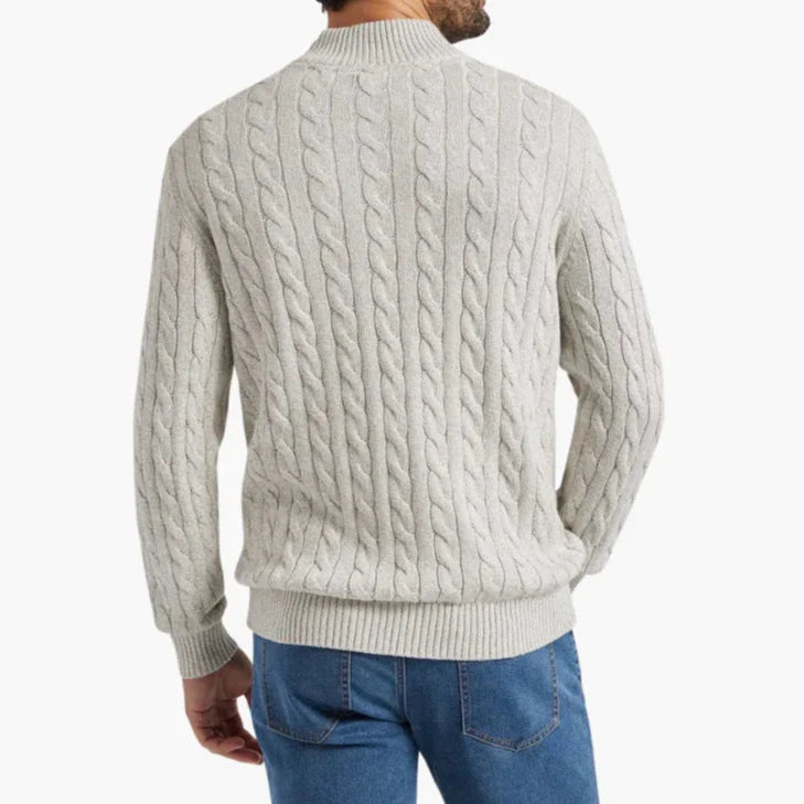 Allsidig herregenser med halv glidelås i nøytral farge. En komfortabel og elegant genser for menn.