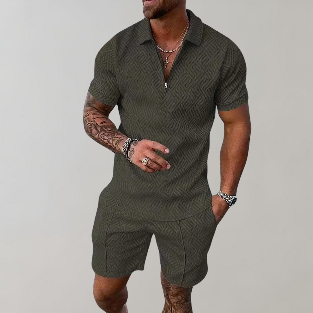"Stilig poloshirt og shorts for menn i marineblå, perfekt for sommeren med komfortabel passform og elastisk midje."