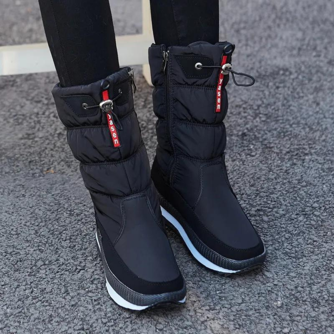 "Stilige og varme vinterboots for kvinner i svart, rosa, lilla og hvit med slippsikre såler og høykvalitetsmaterialer."