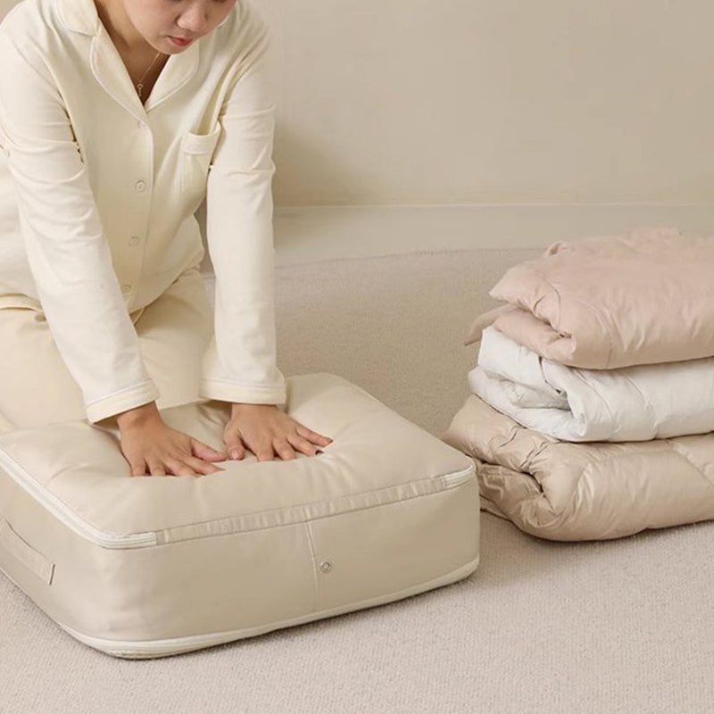 "Stor kompresjons oppbevaringspose i pustende sateng for dyner, med håndtak og glidelås for enkel transport og lagring."