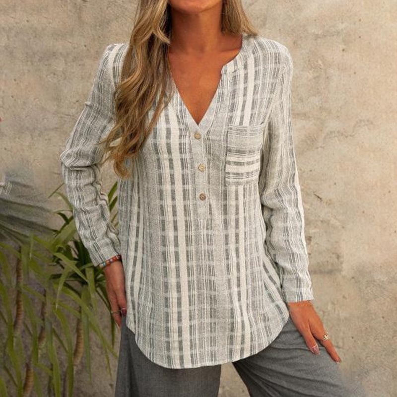 "Stripete langermet bluse med V-hals, uformelt design, viser horisontale striper og lange ermer, perfekt for vår/høst."