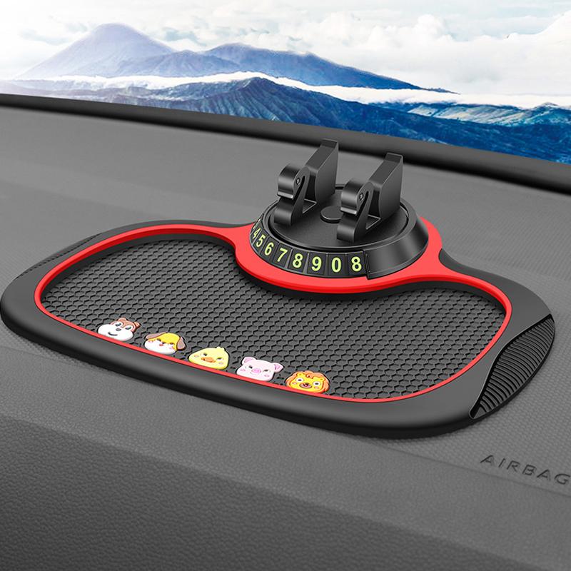 "Svart mobiltelefonbrakett for bil, antiskli-bivoksmønster, 360° rotasjon, kompakt design for dashbordet."