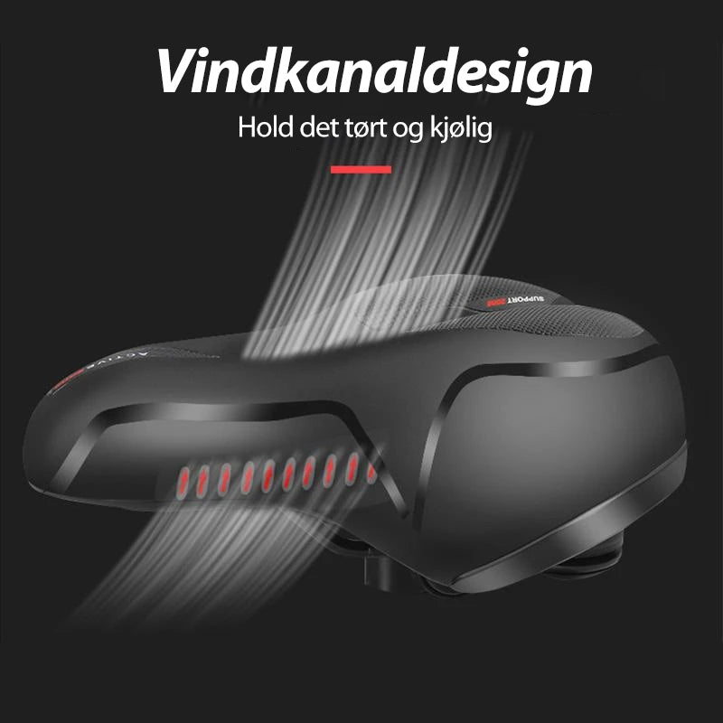 "Sykkel setepute i myk silikon med pustende design, uthevet i blått med luftehull for maksimal komfort på lange turer."