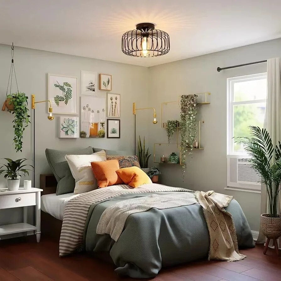 "Taklampe i jern med fugleburdesign, moderne stil, holdbart materialvalg, elegant belysning for hjemmets rom."