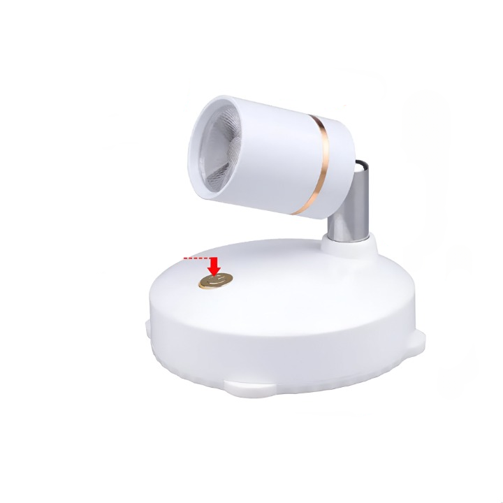 Trådløs mini LED spotlight med dimbart lys, perfekt for aksentbelysning i moderne hjem og kontor.