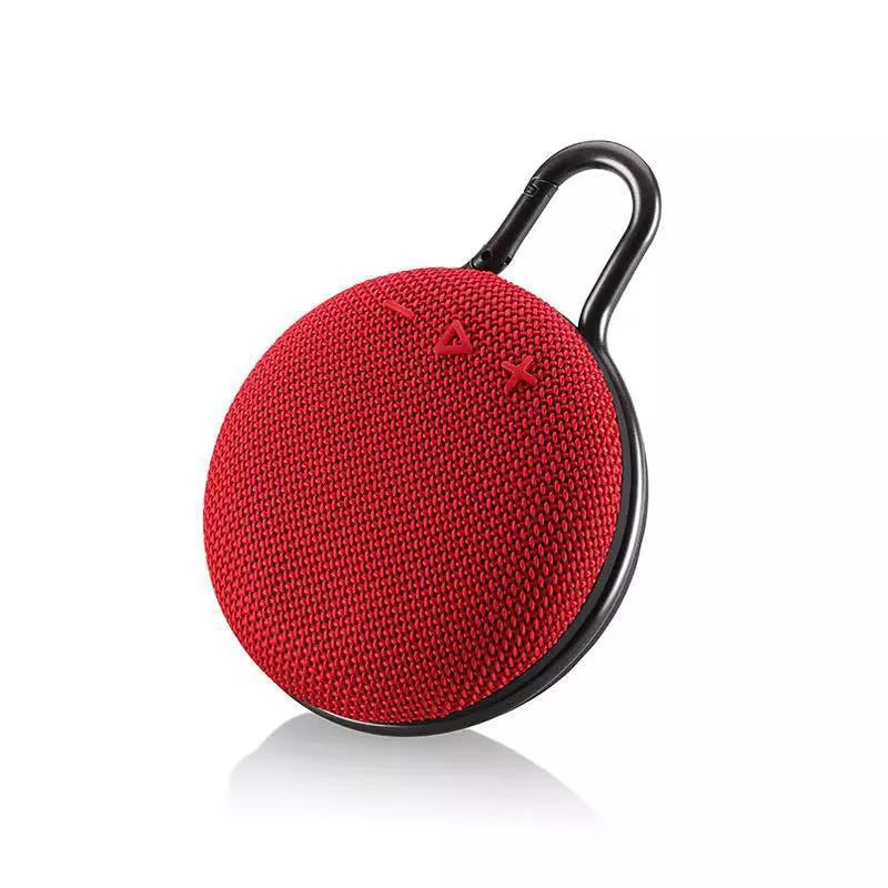 "Trådløs Bluetooth-høyttaler med kraftig bass, kompakt design, bærbar, i flere farger som blå, grå og svart"