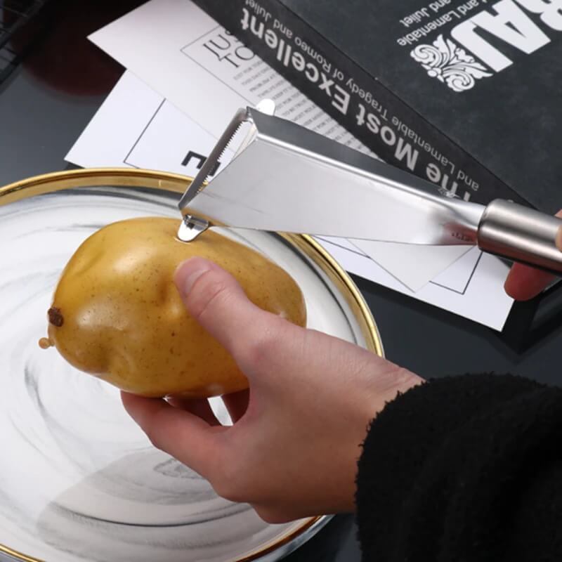 Allsidig kjøkkenverktøy: Trekantet fruktskjæringskniv i rustfritt stål for detaljert matkunst og dekorativ frukt.
