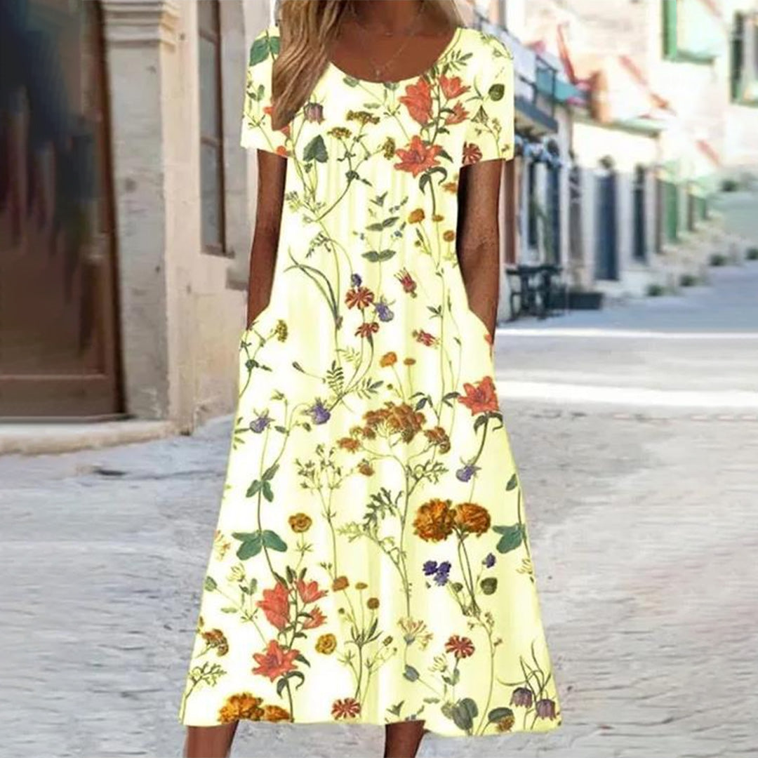 "Uformell sommerkjole med blomsterprint i myk polyester, stråler sommerlig eleganse, perfekt for varme dager og allsidige anl