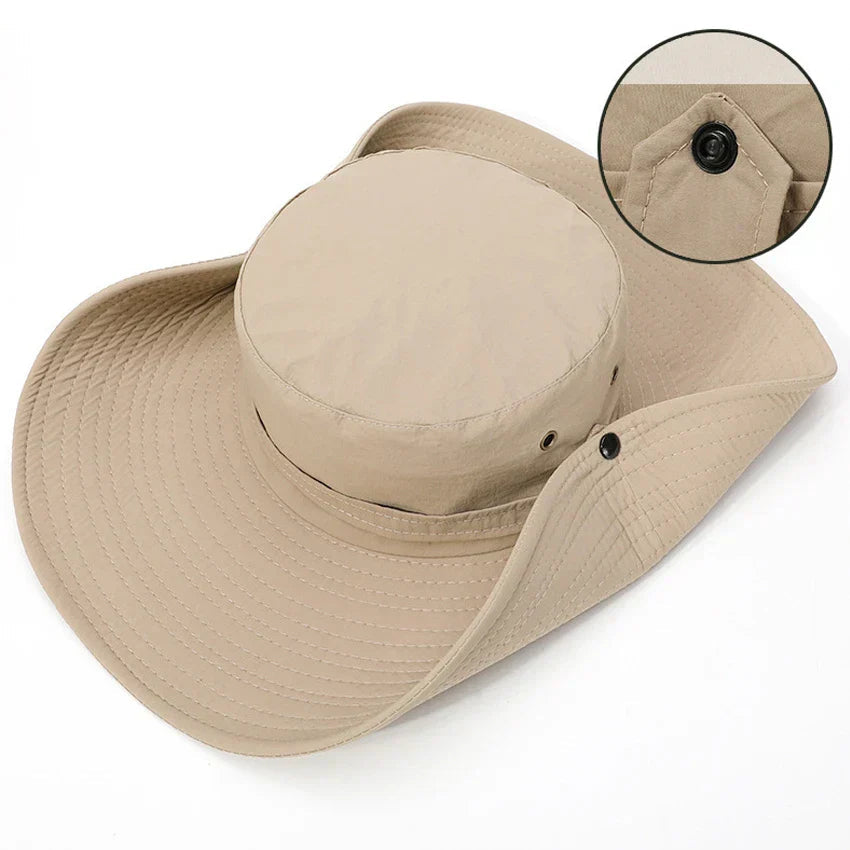 Komfortabel unisex bøttehatt med pustende stoff og hakestropp, perfekt som solhatt og turbøttehatt.