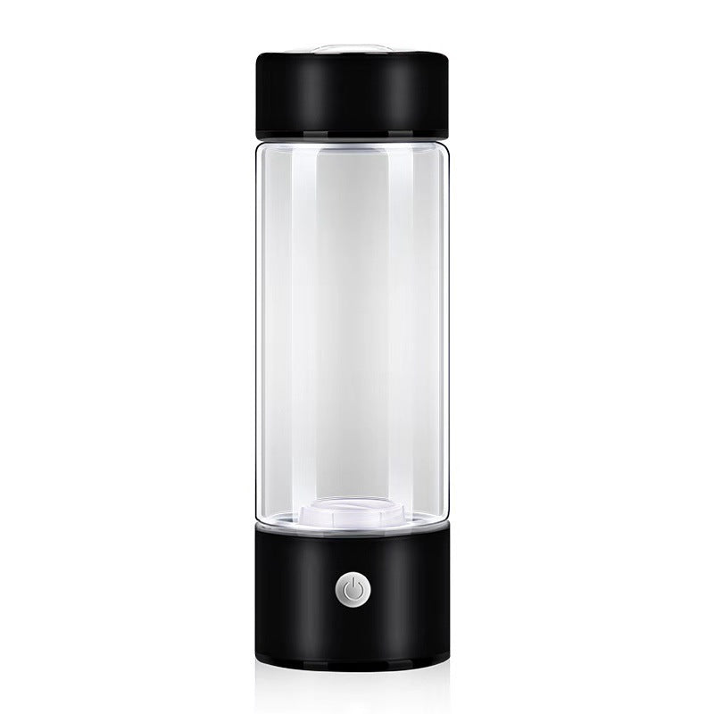 Elegant og moderne hydrogen vannflaske i borosilikatglass, designet for optimal hydrering, enkel å lade via USB.