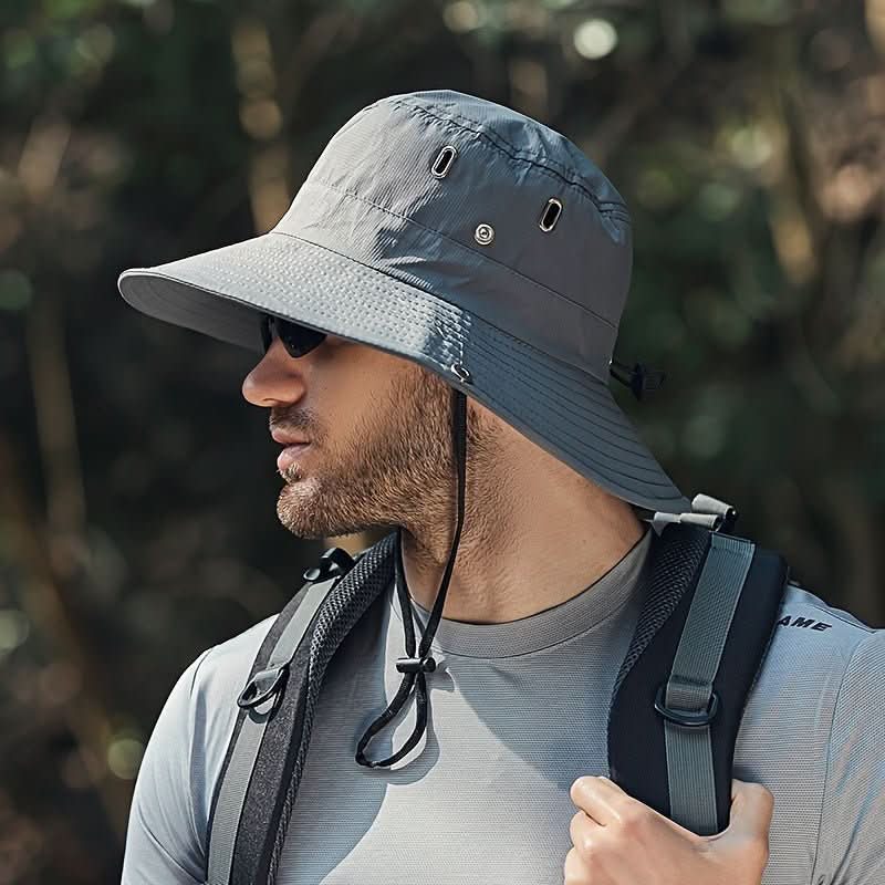 Sammenleggbar unisex solhatt med UV-beskyttelse, bred rand, perfekt for reiser og utendørsaktiviteter.