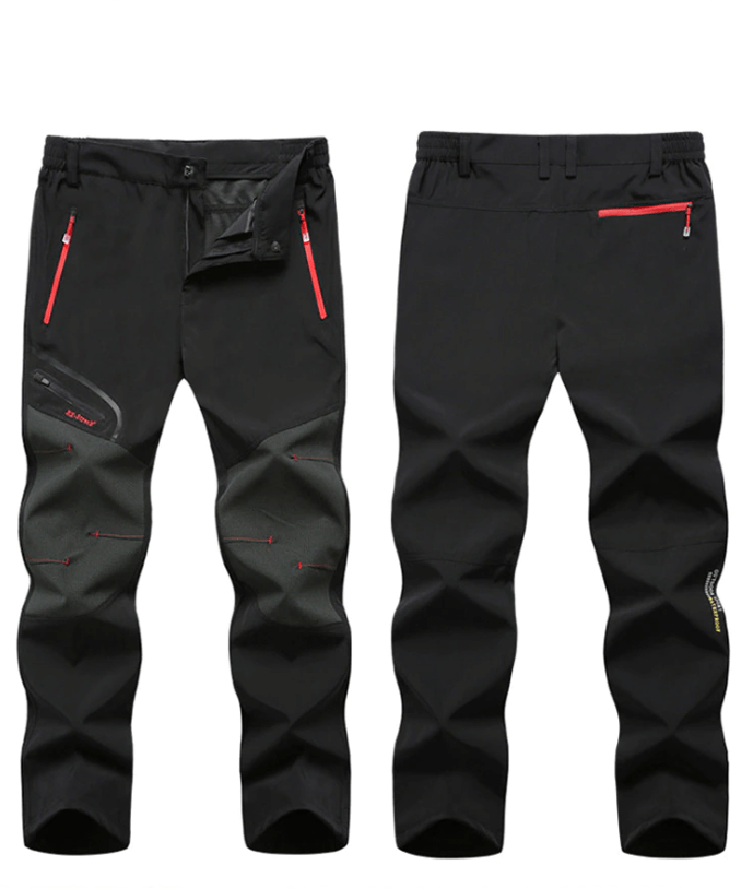 Nærbilde av benavslutningen på turbuksen, justerbar og vanntett, viktig for utendørs bruk.