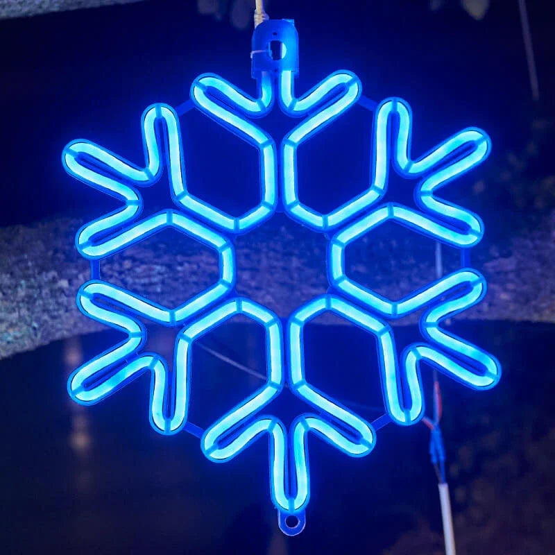 Vanntett utendørs LED-snøfnugglys med glødende snøfnugg i fall, IP65, flere farger, perfekt for juledekorasjon.
