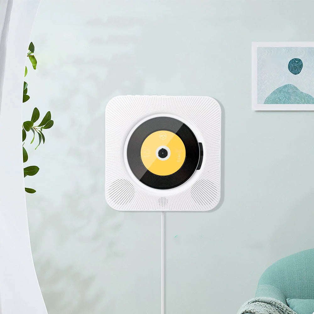 Veggmontert CD-spiller i et minimalistisk interiør, gir stemningsfull belysning – Moderne hjemmeunderholdning
